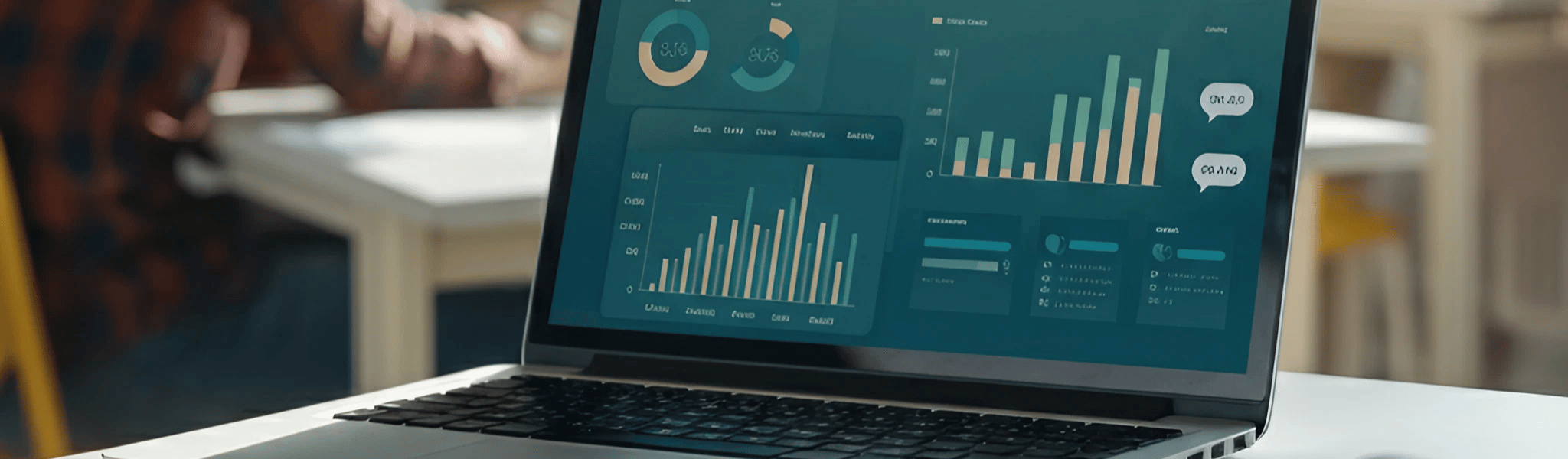Data visualization on laptop screen in room